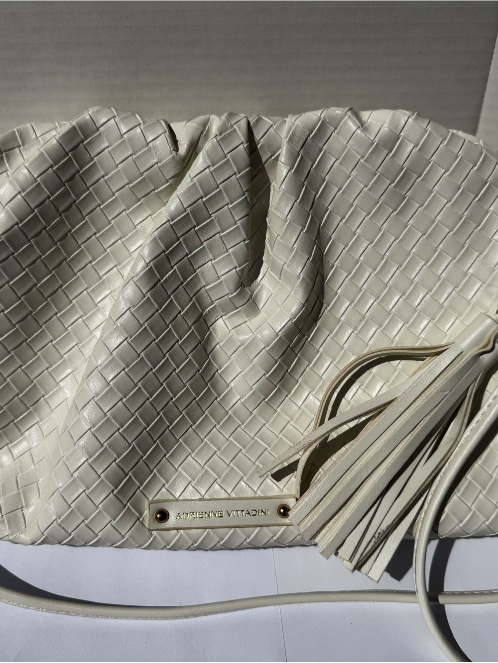 Adrienne Vittadini Cream Woven Leather Clutch with Tassel